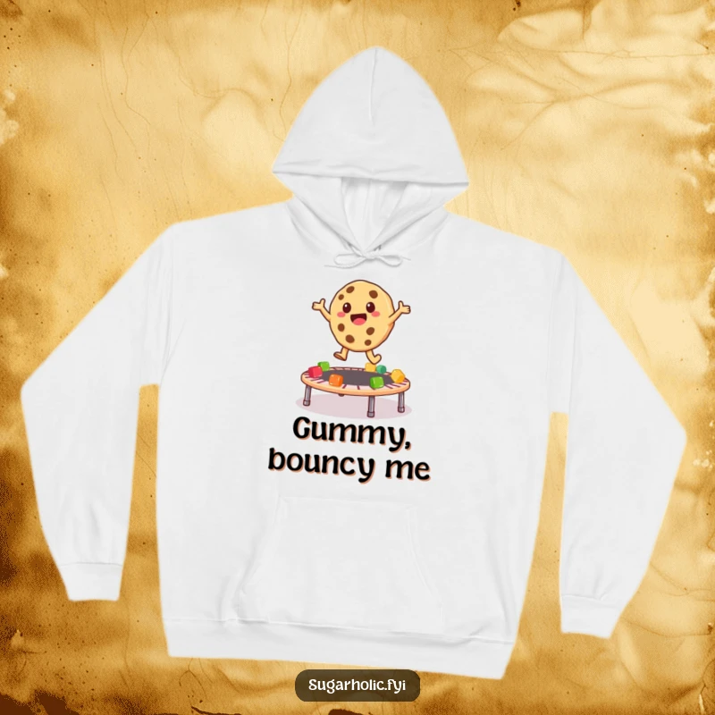 Funny Hoodie featuring a playful cookie character mid-bounce on a vibrant trampoline made of assorted gummy bears, radiating energy.