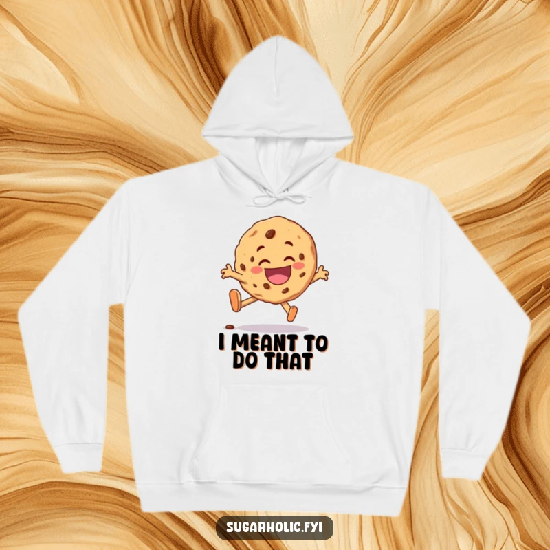 Funny cookie character hoodie, comically tripping yet grinning joyfully, offering a warm and humorous design.