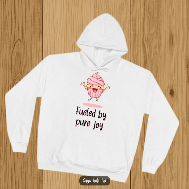 Funny cupcake character in a hoodie, bouncing with excitement and joy, a warm and humorous apparel gift idea.