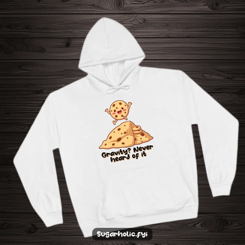 Funny hoodie showcasing a happy cookie cartoon character jumping high over an immense stack of cookies, radiating pure delight.