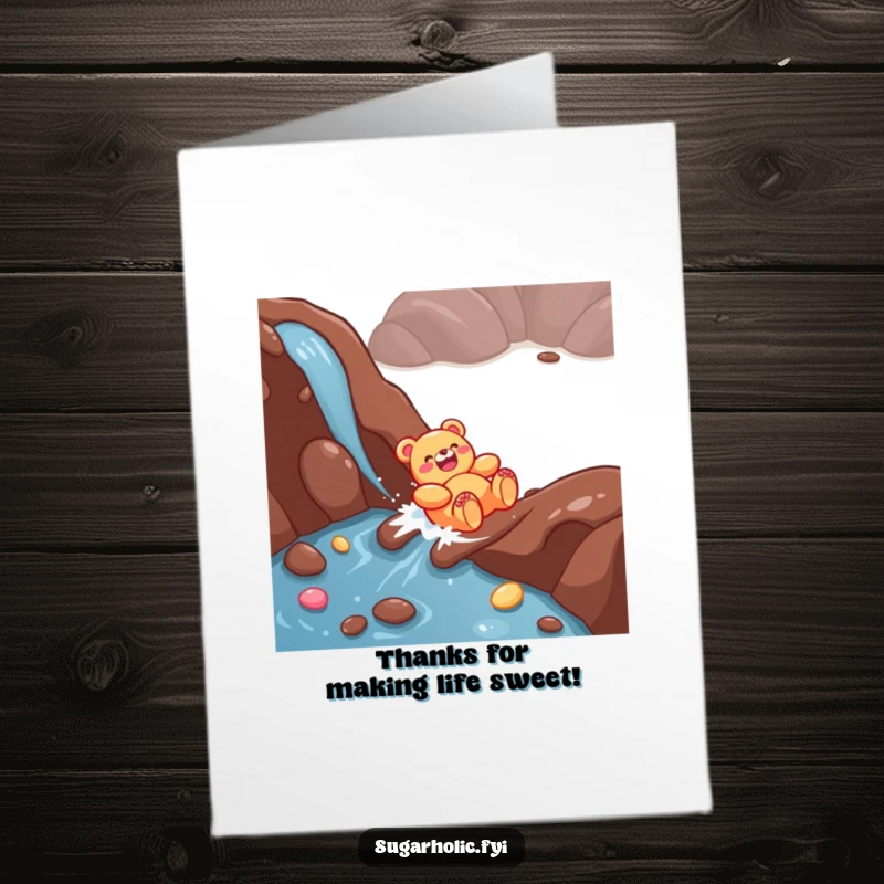Funny Free Printable Thank You Card: A giggling gummy bear rides a chocolate river, sending sweet thanks your way.