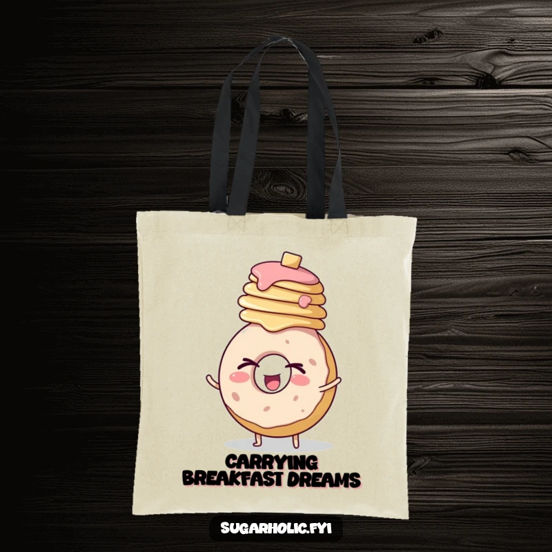Funny tote bag illustration of a round donut character winking enthusiastically while holding a stack of pancakes on its head.
